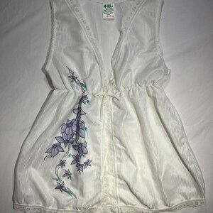 Vintage white sleeveless blouse by High Life, made...